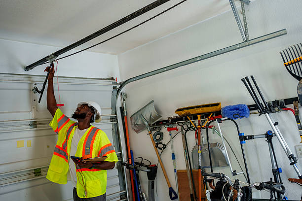 Professional Garage Door Panel Replacement technician working in Greenville, MI